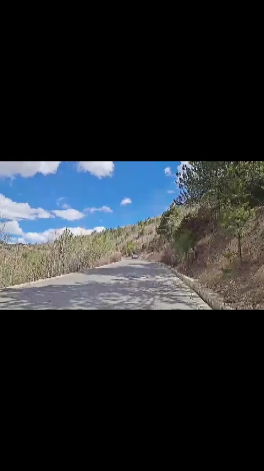 小江爬觉巴山